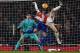 Arsenal's French defender Laurent Koscielny vies with Chelsea's Serbian defender Branislav Ivanovic as Chelsea's Belgian goalkeeper Thibaut Courtois (L) looks on during the English Premier League football match between Arsenal and Chelsea at the Emirates