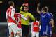 LONDON, ENGLAND - JANUARY 24: Per Mertesacker of Arsenal is shown the red card and is sent off for his challenge on Diego Costa of Chelsea during the Barclays Premier League match between Arsenal and Chelsea at The Emirates Stadium on January 24, 2016 in
