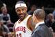 CLEVELAND, OH - NOVEMBER 23: LeBron James #23 and assistant coach Tyronn Lue of the Cleveland Cavaliers talk during the game against the Orlando Magic on November 23, 2015 at Quicken Loans Arena in Cleveland, Ohio. NOTE TO USER: User expressly acknowledge