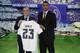 Brazilian Danilo (R) poses with Real Madrid's President Florentino Perez as they hold Danilo's jersey during his presentation as new player of Real Madrid Football Club at Santiago Bernabeu stadium in Madrid on July 9, 2015. AFP PHOTO/ PIERRE-PHILIPPE MAR