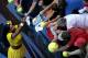 Serena Williams signs autographs after winning her quarterfinals match against Maria Sharapova at the 2016 Australian Open.