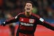 Leverkusen's Mexican striker Javier Hernandez celebrates after scoring during the German first division Bundesliga football match Bayer 04 Leverkusen vs Borussia Moenchengladbach in Leverkusen, western Germany, on December 12, 2015.
/ AFP / PATRIK STOLL