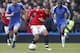 Manchester United's Mexican striker Javier Hernandez (C) dribbles the ball during the FA Cup quarter final replay football match between Chelsea and Manchester United at Stamford Bridge stadium in London, England on April 1, 2013. AFP PHOTO/IAN KINGTONRE