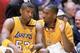 LOS ANGELES - FEBRUARY 14: Kobe Bryant #8 of the Los Angeles Lakers talks to Samaki Walker #52 during the NBA game against the San Antonio Spurs at Staples Center on February 14, 2003 in Los Angeles, California. The Spurs won 103-95. NOTE TO USER: User ex