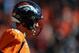 DENVER, CO - JANUARY 24: Peyton Manning #18 of the Denver Broncos warms up on the field before the AFC Championship game against the New England Patriots at Sports Authority Field at Mile High on January 24, 2016 in Denver, Colorado. (Photo by Dustin Br