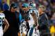 CHARLOTTE, NC - JANUARY 24: Head coach Ron Rivera of the Carolina Panthers talks with an injured Thomas Davis #58 after a play against the Arizona Cardinals during the NFC Championship Game at Bank of America Stadium on January 24, 2016 in Charlotte, No
