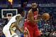 NEW ORLEANS, LA - JANUARY 25: James Harden #13 of the Houston Rockets works against Jrue Holiday #11 of the New Orleans Pelicans during the second half of a game at the Smoothie King Center on January 25, 2016 in New Orleans, Louisiana. Houston defeated