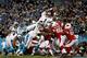 CHARLOTTE, NC - JANUARY 24: Cam Newton #1 of the Carolina Panthers scores a touchdown in the second quarter against the Arizona Cardinals during the NFC Championship Game at Bank of America Stadium on January 24, 2016 in Charlotte, North Carolina. (Phot