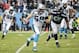 Jan 17, 2016; Charlotte, NC, USA; Carolina Panthers middle linebacker Luke Kuechly (59) runs the ball for a touchdown past Seattle Seahawks center Patrick Lewis (65) during the first quarter in a NFC Divisional round playoff game at Bank of America Stadiu