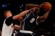 NEW YORK, NY - JANUARY 26: Serge Ibaka #9 of the Oklahoma City Thunder grabs the rebound as Kristaps Porzingis #6 of the New York Knicks defends at Madison Square Garden on January 26, 2016 in New York City.The Oklahoma City Thunder defeated the New York