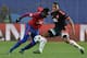CSKA Moscow's Nigerian forward Ahmed Musa (L) vies for the ball with Manchester United's Ecuadorian midfielder Luis Antonio Valencia during the UEFA Champions League group B football match between PFC CSKA Moscow and FC Manchester United at the Arena Khim
