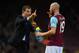 LONDON, ENGLAND - JANUARY 23: West Ham manager Slaven Bilic gives instructions to James Collins of West Ham United during the Barclays Premier League match between West Ham United and Manchester City at Boleyn Ground in London, England. (Photo by Mike H