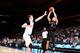 NEW YORK, NY - JANUARY 29: Devin Booker #1 of the Phoenix Suns shoots the ball against Kristaps Porzingis #6 of the New York Knicks on January 29, 2016 at Madison Square Garden in New York City, New York. NOTE TO USER: User expressly acknowledges and ag