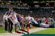 MIAMI GARDENS, FL - DECEMBER 14: Odell Beckham #13 of the New York Giants catches a touchdown pass as Brent Grimes #21 of the Miami Dolphins defends during the third quarter of the game at Sun Life Stadium on December 14, 2015 in Miami Gardens, Florida.