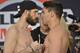Couture and Pitbull get up close and personal at Thursday's weigh-in.