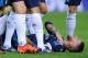 SEVILLE, SPAIN - NOVEMBER 08: Sergio Ramos of Real Madrid holds his shoulder after getting injured while scoring his team's opening goal during the La Liga match between Sevilla FC and Real Madrid CF at Estadio Ramon Sanchez Pizjuan on November 8, 2015 i