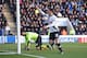 Carroll netted late on for Spurs.