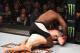 Johnson pounds Bader from full back mount.