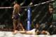 Johnson walks away from an unconscious Bader.