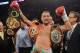 MONTREAL, QC - MARCH 14: Sergey Kovalev stands with all the belts after defeating Jean Pascal (not pictured) during their Unified light heavyweight championship bout at the Bell Centre on March 14, 2015 in Montreal, Quebec, Canada. (Photo by Richard Wol