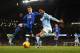 Everton's English defender John Stones (L) vies with Manchester City's English midfielder Raheem Sterling during the English League Cup semi-final second leg football match between Manchester City and Everton the Etihad Stadium in Manchester, north west E