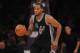 January 22, 2016; Los Angeles, CA, USA; San Antonio Spurs forward Kawhi Leonard (2) moves the ball up court against Los Angeles Lakers during the second half at Staples Center. Mandatory Credit: Gary A. Vasquez-USA TODAY Sports