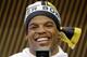 Cam Newton answering questions at media night