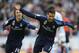 Real Madrid's Portuguese forward Cristiano Ronaldo (R) celebrates with teammate Croatian midfielder Luka Modric after scoring a goal during the Spanish league football match Celta Vigo vs Real Madrid CF at the Balaidos stadium in Vigo on October 24, 2015.