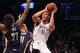 Feb 3, 2016; Brooklyn, NY, USA; Indiana Pacers guard Monta Ellis (11) fouls Brooklyn Nets center Brook Lopez (11) during the first quarter at Barclays Center. Mandatory Credit: Anthony Gruppuso-USA TODAY Sports