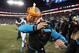 CHARLOTTE, NC - JANUARY 24: Head coach Ron Rivera of the Carolina Panthers is doused with Gatorade by Charles Johnson #95 and Cam Newton #1 after the Carolina Panthers defeat the Arizona Cardinals with a score of 49 to 15 in the NFC Championship Game at