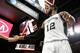 SAN ANTONIO,TX - FEBRUARY 3: LaMarcus Aldridge #12 of the San Antonio Spurs gets congratulates from Manu Ginobili #20 of the San Antonio Spurs at AT&T Center on February 3, 2016 in San Antonio, Texas. NOTE TO USER: User expressly acknowledges and agrees