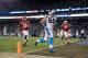 CHARLOTTE, NC - JANUARY 24: Luke Kuechly #59 of the Carolina Panthers scores a touchdown after intercepting a pass in the fourth quarter against the Arizona Cardinals during the NFC Championship Game at Bank of America Stadium on January 24, 2016 in Char