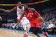 OKLAHOMA CITY, OK - NOVEMBER 4: DeMarre Carroll #5 of the Toronto Raptors drives to the basket against Kevin Durant #35 of the Oklahoma City Thunder during the game on November 4, 2015 at Chesapeake Energy Arena in Oklahoma City, Oklahoma. NOTE TO USER: U