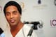 Brazil's football player Ronaldinho attends an agreement signing ceremony with local football club Tampines Rovers in Singapore on December 10, 2015. Brazilian legend Ronaldinho on December 10 signed an agreement to establish a football academy in soccer-