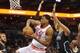 Feb 5, 2016; Charlotte, NC, USA; Miami Heat center Hassan Whiteside (21) fights Charlotte Hornets guard Jeremy Lamb (3) for a rebound during the first half of the game at Time Warner Cable Arena. Mandatory Credit: Sam Sharpe-USA TODAY Sports