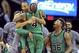 Feb 5, 2016; Cleveland, OH, USA; Boston Celtics guard Avery Bradley (0) celebrates with guard Isaiah Thomas (4) after making a three-point shot to end the game and beat the Cleveland Cavaliers at Quicken Loans Arena. The Celtics won 104-103. Mandatory Cre