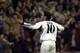 MADRID, SPAIN - DECEMBER 5: Real Madrid's striker Luis Figo waves to crowd after scoring a goal on a penalty shot against Anderlecht 05 December 2000, during their Champions League group D match in Madrid. (Photo credit should read MARC ALEX/AFP/Getty I