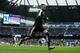 Leicester City's Algerian midfielder Riyad Mahrez celebrates after scoring his team's second goal during the English Premier League football match between Manchester City and Leicester City at the Etihad Stadium in Manchester, north west England, on Febru