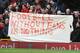Liverpool fans hold a banner as they protest against the recently announced rise in ticket prices during the English Premier League football match between Liverpool and Sunderland at Anfield in Liverpool, northwest England, on February 6, 2016. / AFP / LI