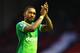 LIVERPOOL, ENGLAND - FEBRUARY 06: Jermain Defoe of Sunderland applauds away supporters after the 2-2 draw in the Barclays Premier League match between Liverpool and Sunderland at Anfield on February 6, 2016 in Liverpool, England. (Photo by Clive Brunski