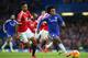 LONDON, ENGLAND - FEBRUARY 07: Cameron Borthwick-Jackson of Manchester United closes down Willian of Chelsea during the Barclays Premier League match between Chelsea and Manchester United at Stamford Bridge on February 7, 2016 in London, England. (Photo