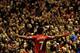 Liverpool's Uruguayan striker Luis Suarez celebrates scoring their second goal during the English Premier League football match between Liverpool and Hull City at Anfield in Liverpool, northwest England, on January 1, 2014. AFP PHOTO / PAUL ELLIS
RESTRI
