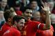 Liverpool's Uruguayan striker Luis Suarez (2R) celebrates after Liverpool's English midfielder Raheem Sterling scored their team's second goal during the English Premier League football match between Liverpool and Cardiff City at Anfield stadium in Liverp