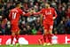 LIVERPOOL, ENGLAND - FEBRUARY 06: Adam Lallana (R) of Liverpool celebrates scoring his team's second goal with his team mate Roberto Firmino (L) during the Barclays Premier League match between Liverpool and Sunderland at Anfield on February 6, 2016 in Li