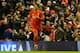 Liverpool's Brazilian midfielder Roberto Firmino celebrates after scoring during the English Premier League football match between Liverpool and Arsenal at Anfield stadium in Liverpool, north-west England on January 13, 2016.
AFP PHOTO / PAUL ELLIS
RESTRI