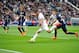 PARIS, FRANCE - APRIL 25: Marquinhos (R) of PSG and Sofiane Boufal (L) of Llosc Lille in action during the Ligue 1 game between Paris Saint Germain and Llosc Lille at Parc des Princes on April 25, 2015 in Paris, France. (Photo by Aurelien Meunier/Getty