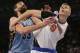 Feb 5, 2016; New York, NY, USA; New York Knicks forward Kristaps Porzingis (6) and Memphis Grizzlies center Marc Gasol (33) battle for a rebound during the first half at Madison Square Garden. Mandatory Credit: Adam Hunger-USA TODAY Sports