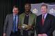 SAN FRANCISCO, CA - FEBRUARY 08: Head coach Gary Kubiak of the Denver Broncos (L) and NFL commissioner Roger Goodell (R) poses with the Super Bowl 50 MVP Von Miller holding the trophy at the Moscone Center West on February 8, 2016 in San Francisco, Calif