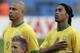 Brazilian forward Ronaldo (L) and Brazilian midfielder Ronaldinho (R) listen the national anthems at the start of the quarter-final World Cup football match between Brazil and France at Frankfurt's World Cup Stadium, 01 July 2006. The winner of this match