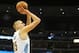 Dec 8, 2015; Denver, CO, USA; Denver Nuggets center Nikola Jokic (15) shoots the ball during the first half against the Orlando Magic at Pepsi Center. Mandatory Credit: Chris Humphreys-USA TODAY Sports